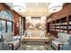 A cozy library featuring built-in bookshelves, comfortable seating and natural light at 195 14Th Ne St # Ph 306, Atlanta, GA 30309