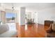 Inviting living room with hardwood floors, an open floor plan, and an adjacent dining area at 195 14Th Ne St # Ph 306, Atlanta, GA 30309