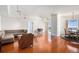 Spacious living room with hardwood floors, neutral colors, and lots of natural light from the balcony at 195 14Th Ne St # Ph 306, Atlanta, GA 30309