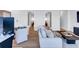 Stylish living room with modern furnishings, hardwood floors, and a glimpse into the bedrooms at 45 Ivan Allen Jr Nw Blvd # 1704, Atlanta, GA 30308