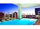 Stunning rooftop pool with lounge chairs and panoramic city views at twilight at 45 Ivan Allen Jr Nw Blvd # 1704, Atlanta, GA 30308