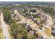 An overhead real estate shot features a quiet, Gathering-friendly neighborhood with well-maintained lawns and homes at 50 Riverstone Dr, Covington, GA 30014