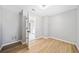 Neutral bedroom featuring wood floors and grey walls at 50 Riverstone Dr, Covington, GA 30014