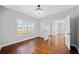 Bright bedroom with hardwood floors, a large window, and ample natural light at 50 Riverstone Dr, Covington, GA 30014
