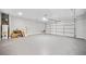 Spacious two car garage with high ceilings and plenty of room for storage at 50 Riverstone Dr, Covington, GA 30014