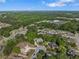 Aerial view of the neighborhood, showing a variety of homes surrounded by lush greenery at 711 Wilhaven Ct, Loganville, GA 30052