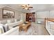 Bonus room with a white sofa and built in shelves at 711 Wilhaven Ct, Loganville, GA 30052
