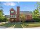 Spacious house featuring a back deck and landscaped backyard at 711 Wilhaven Ct, Loganville, GA 30052