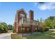 Two-story home with a spacious deck, perfect for outdoor entertaining at 711 Wilhaven Ct, Loganville, GA 30052