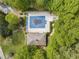 Aerial view of a neighborhood pool, cabana, and pool deck at 711 Wilhaven Ct, Loganville, GA 30052