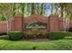 Landscaped entrance to Lake Hodges Landing community at 711 Wilhaven Ct, Loganville, GA 30052