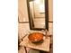 Bathroom featuring a decorative granite topped vanity, stylish bowl sink and tiled backsplash at 885 White Sw St, Atlanta, GA 30310