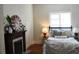 Comfortable bedroom featuring a fireplace, soft bedding and ample natural light at 885 White Sw St, Atlanta, GA 30310