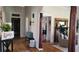 Bright foyer with gorgeous wood floors and a view into the dining room at 885 White Sw St, Atlanta, GA 30310