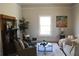 Charming living room features a cozy fireplace and natural lighting at 885 White Sw St, Atlanta, GA 30310