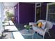 Relaxing porch seating area is furnished with comfortable outdoor seating at 885 White Sw St, Atlanta, GA 30310