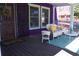 Inviting front porch is adorned with seating and charming decorations at 885 White Sw St, Atlanta, GA 30310