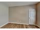 This cozy bedroom features wood-look floors and a neutral color at 4590 Carver Ct, Cumming, GA 30040