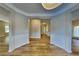 Spacious foyer with wood-look flooring and decorative trim at 4590 Carver Ct, Cumming, GA 30040