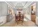 Charming dining room featuring stylish wallpaper and a modern light fixture at 5395 Steeple Chase, Douglasville, GA 30135