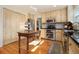 Modern kitchen featuring stainless steel appliances, wood cabinets, and island prep area at 5395 Steeple Chase, Douglasville, GA 30135