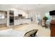 Cozy kitchenette featuring white cabinets and a dining table at 5395 Steeple Chase, Douglasville, GA 30135