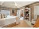 Inviting main bedroom with soft lighting, neutral tones, and a cozy seating area at 5395 Steeple Chase, Douglasville, GA 30135