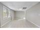 Neutral basement with tile flooring and single window for natural light at 740 Frank Kirk Nw Rd, Kennesaw, GA 30152