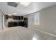 Basement kitchenette with dark wood cabinets and tile floor at 740 Frank Kirk Nw Rd, Kennesaw, GA 30152