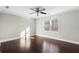 Bedroom with hardwood floors, ceiling fan, crown molding and double hung window at 740 Frank Kirk Nw Rd, Kennesaw, GA 30152