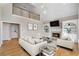 Living room boasts vaulted ceilings, a fireplace with built-ins, and an open floor plan at 740 Frank Kirk Nw Rd, Kennesaw, GA 30152