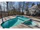 Large swimming pool and spa in a private backyard, perfect for relaxation and entertaining at 740 Frank Kirk Nw Rd, Kennesaw, GA 30152