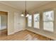 Dining area with hardwood floors and views of the outdoor deck at 106 Little Barley Ln, Grayson, GA 30017