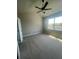 Bedroom with vaulted ceilings, a fan and large windows at 274 Lakeside Pl, Canton, GA 30114