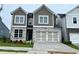Charming new construction two-story home with stone accents and a two-car garage at 274 Lakeside Pl, Canton, GA 30114