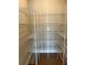 Walk-in closet with white wire shelving and hardwood floors at 274 Lakeside Pl, Canton, GA 30114