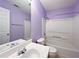 Clean bathroom features a sink with mirror, toilet, and shower/tub combo at 1421 Gates Se Cir, Atlanta, GA 30316