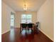 Dining room with hardwood floors, modern lighting, and space for Gathering gatherings at 1421 Gates Se Cir, Atlanta, GA 30316