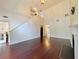 Spacious living room with hardwood floors, fireplace, and high ceilings with big windows at 1421 Gates Se Cir, Atlanta, GA 30316