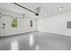 Spacious three car garage with epoxy floor at 1255 E M Croy Rd, Sugar Hill, GA 30518