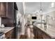 Contemporary kitchen with an island, granite countertops, and stainless steel refrigerator at 1370 Dupont Nw Park, Atlanta, GA 30318