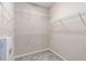 Walk-in closet with carpeted floors and metal shelving at 1370 Dupont Nw Park, Atlanta, GA 30318