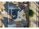 Bird's-eye view of the house, its roof, driveway, landscaping, and neighborhood streets at 4281 Sierra Creek Ct, Hoschton, GA 30548