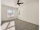 Bright bedroom with plush carpet, ample natural light, and neutral decor, creating a serene retreat at 4281 Sierra Creek Ct, Hoschton, GA 30548