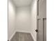 A small walk-in closet with gray carpet at 4281 Sierra Creek Ct, Hoschton, GA 30548
