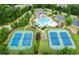A top-down view showcasing the community tennis courts, pool, and other recreational facilities at 4281 Sierra Creek Ct, Hoschton, GA 30548