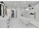 The primary bathroom features marble floors, a soaking tub, walk-in shower, and double vanity at 4281 Sierra Creek Ct, Hoschton, GA 30548