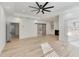 The primary bedroom features a ceiling fan, fireplace, and access to the ensuite bathroom at 4281 Sierra Creek Ct, Hoschton, GA 30548