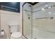 Modern bathroom with stylish fixtures and a tiled shower enclosure at 706 Barrington Hills Dr, Atlanta, GA 30350