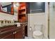 Bathroom with granite counters, stylish fixtures, and tiled floors at 706 Barrington Hills Dr, Atlanta, GA 30350